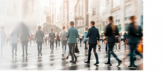 Consumers moving through a busy shopping street
